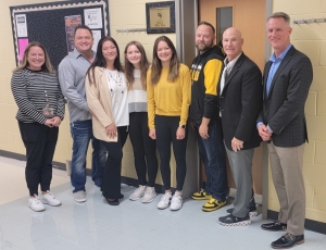 Pictured left to right: Megan Rivet, Assistant Superintendent - Charles Myers - Michele Myers - Lillian - Nicole - Kevin Sucher, Band Director - Dr. Mark Ault, Superintendent - Aaron Marshall, Director of HR/Operations. 